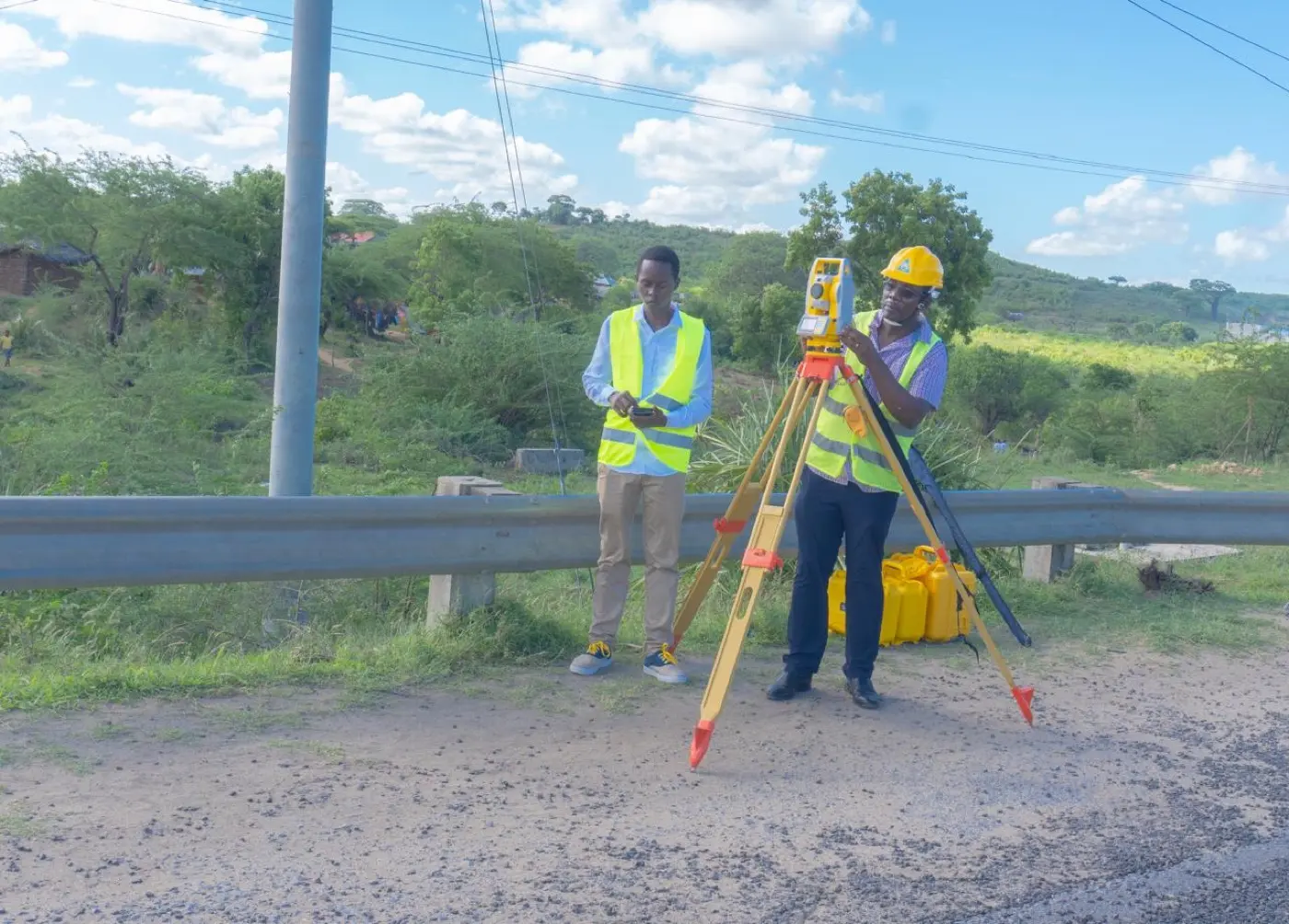 Walterland survey team operating a total station during a roadside survey in Kenya