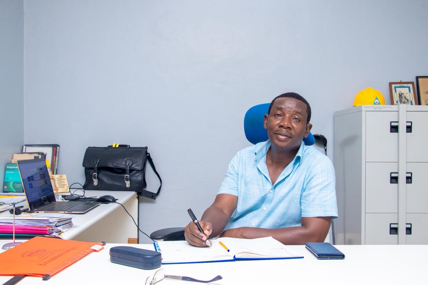 Professional land surveyor Walter Okoth